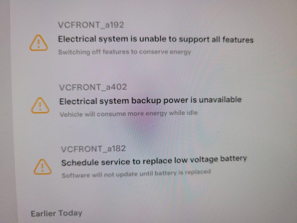 Tesla VCFRONT alerts electrical system power reduced low voltage battery warning